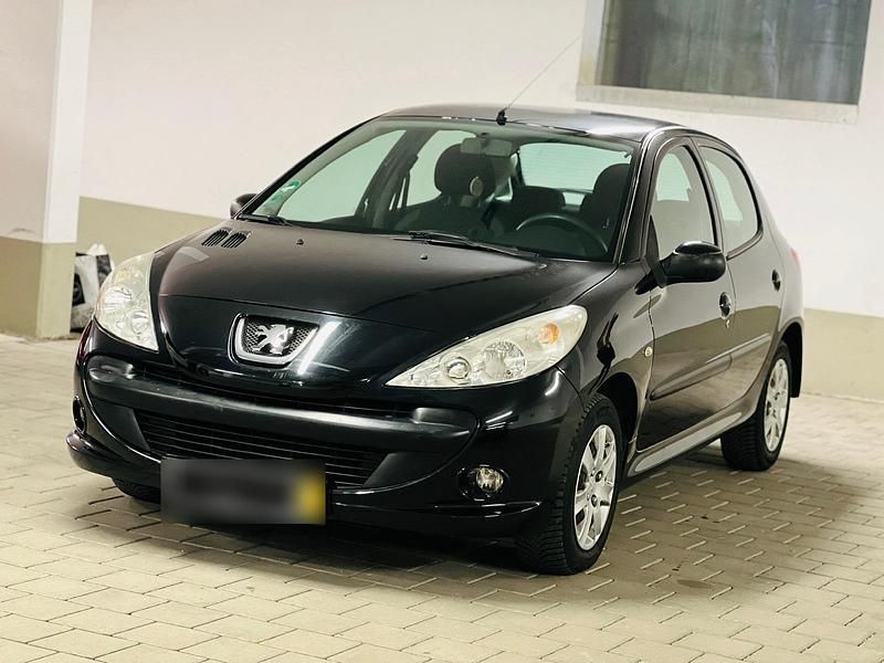 Gebraucht Peugeot 206 75 PS (55 kW) 2010 Schwarz Kleinwagen