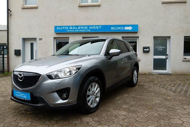 Grau Gebraucht 2012 Mazda CX-5 Center-Line SUV | 10.990 € (Etwas zu teuer) - Bild 1/4