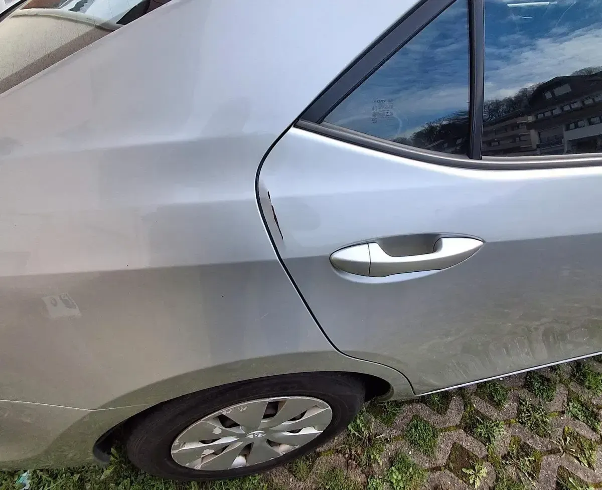 Używany Toyota Corolla 99 KM (72 kW) 2014 Szary Sedan/Limuzyna