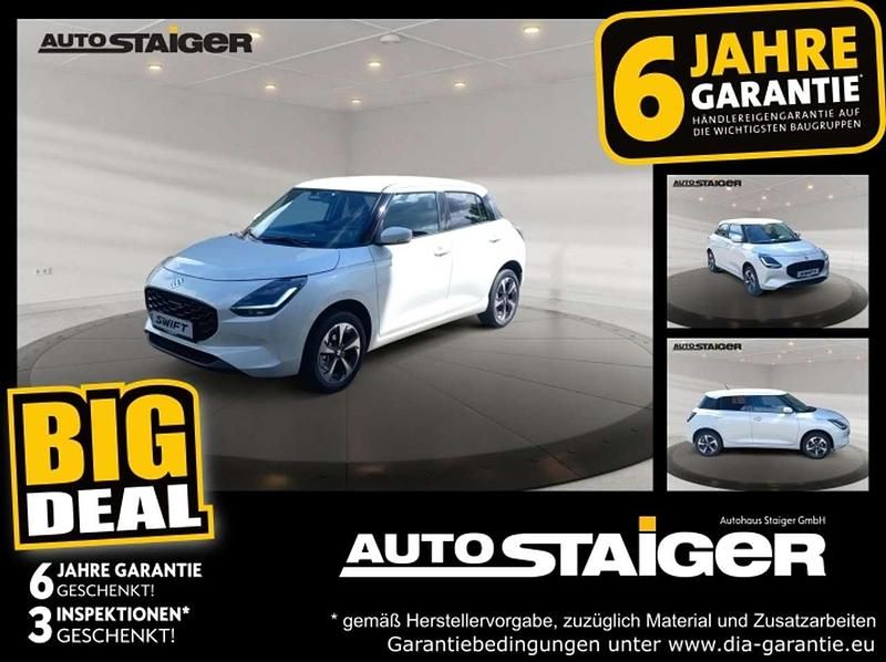Pure white pearl metallic Neu 2024 Suzuki Swift Comfort Kleinwagen | 16.490 € - Bild 1/4