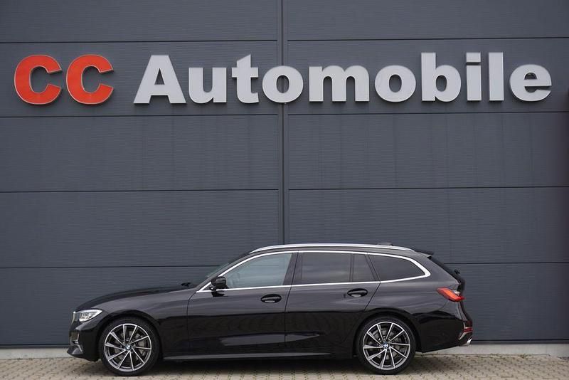 Schwarz ii Gebraucht 2021 BMW 330 Luxury Line Kombi | 25.880 € (Fairer Preis) - Bild 1/4