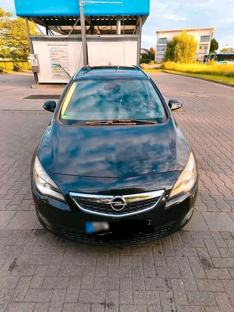Gebraucht Opel Astra 160 PS (117 kW) 2011 Schwarz Kombi