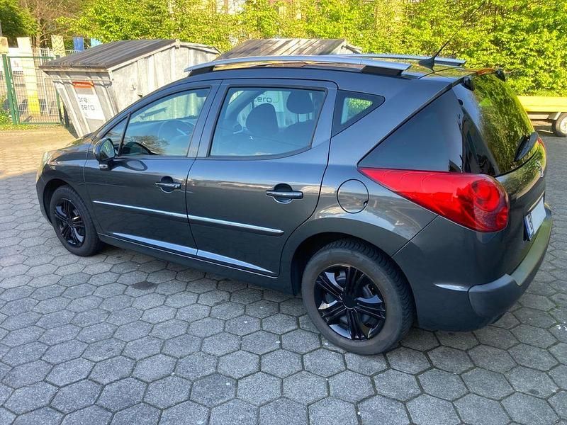 Grau Gebraucht 2009 Peugeot 207 Kombi | 2.490 € (Fairer Preis) - Bild 1/4