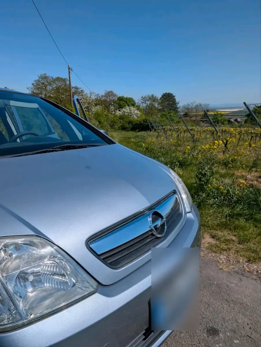 Używany Opel Meriva 122 KM (89 kW) 2010 Srebrny Minivan