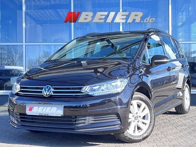 Deep black perleffekt Gebraucht 2023 VW Touran Comfortline Van / Kleinbus | 30.590 € (Guter Preis) - Bild 1/4