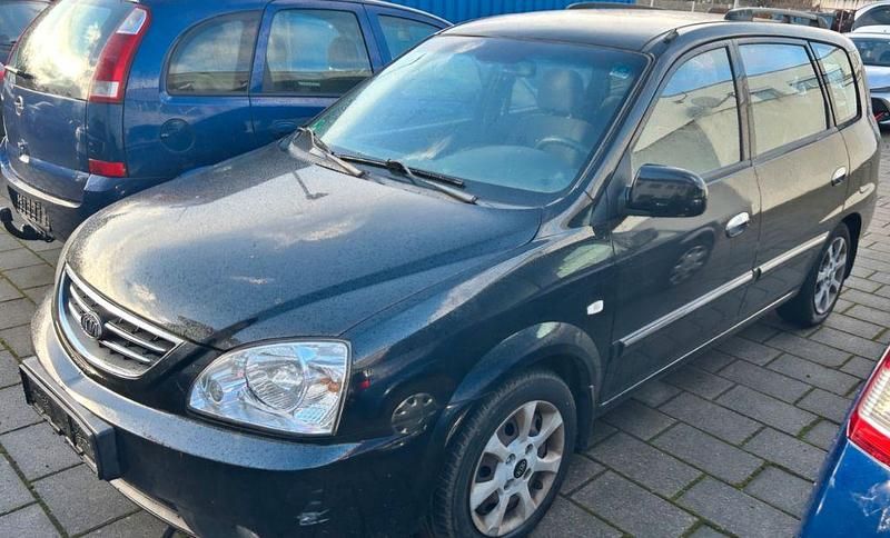 Schwarz Gebraucht 2005 Kia Carens EX Van / Kleinbus | 1.299 € (Fairer Preis) - Bild 1/4