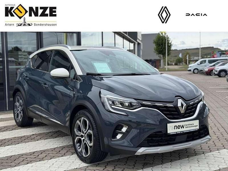 Blau (zweifarbig: rauchblau und alabasterwei) Gebraucht 2020 Renault Captur Intens SUV | 16.490 € (Fairer Preis) - Bild 1/4