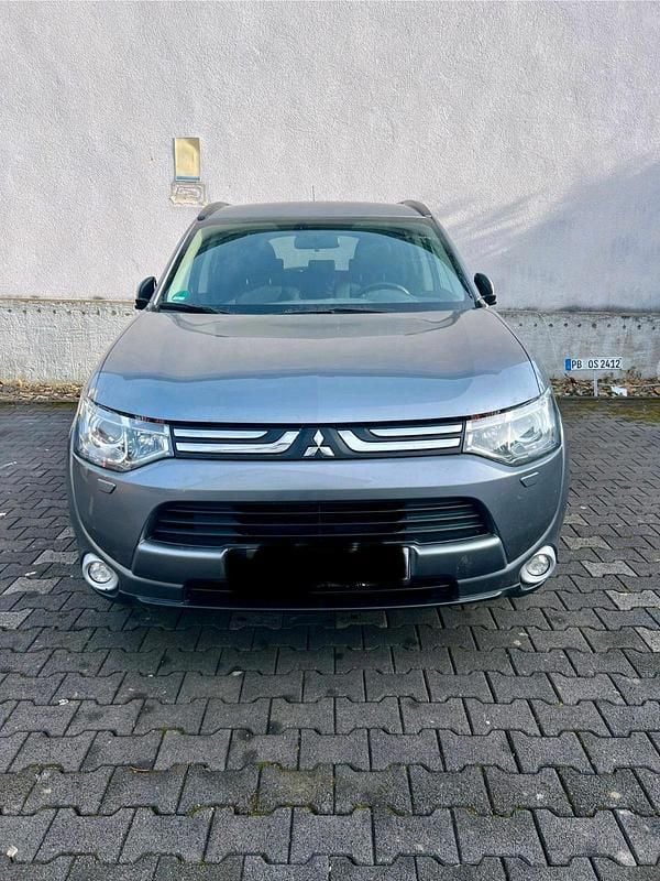 Grau Gebraucht 2013 Mitsubishi Outlander SUV | 5.999 € (Superpreis) - Bild 1/4