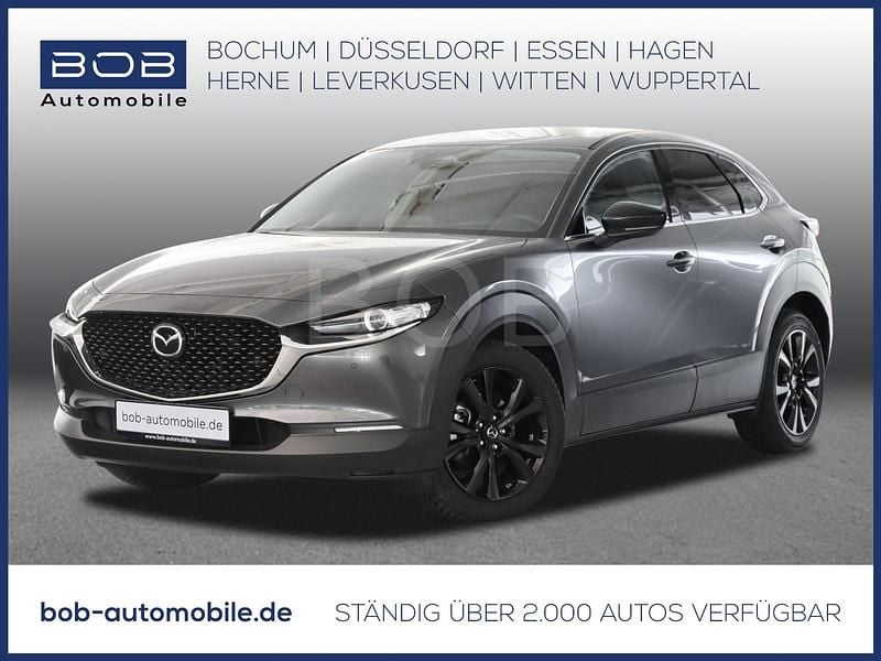 Grau Gebraucht 2024 Mazda CX-30 Homura-Line SUV | 27.870 € (Fairer Preis) - Bild 1/3