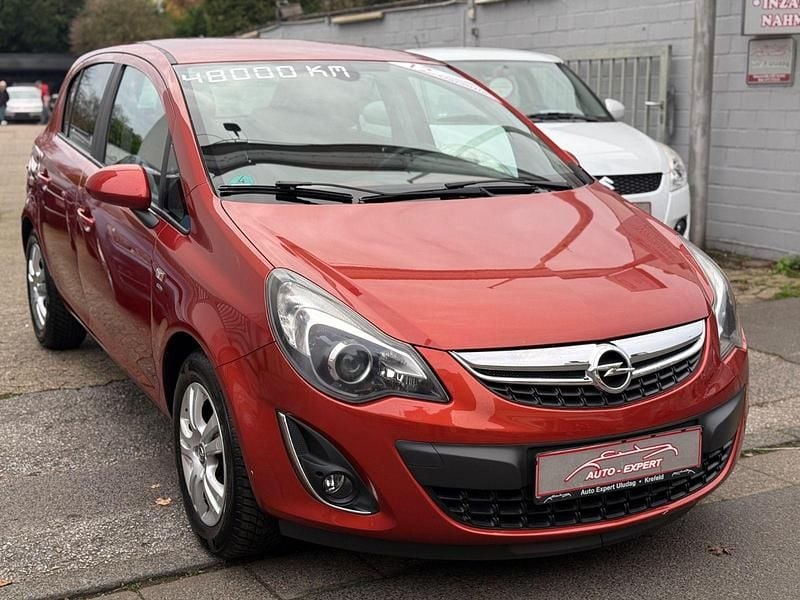 Orange Gebraucht 2013 Opel Corsa Satellite Kleinwagen | 5.990 € (Fairer Preis) - Bild 1/4