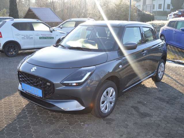 Grau Neu 2025 Suzuki Swift Club Kleinwagen | 21.490 € - Bild 1/4