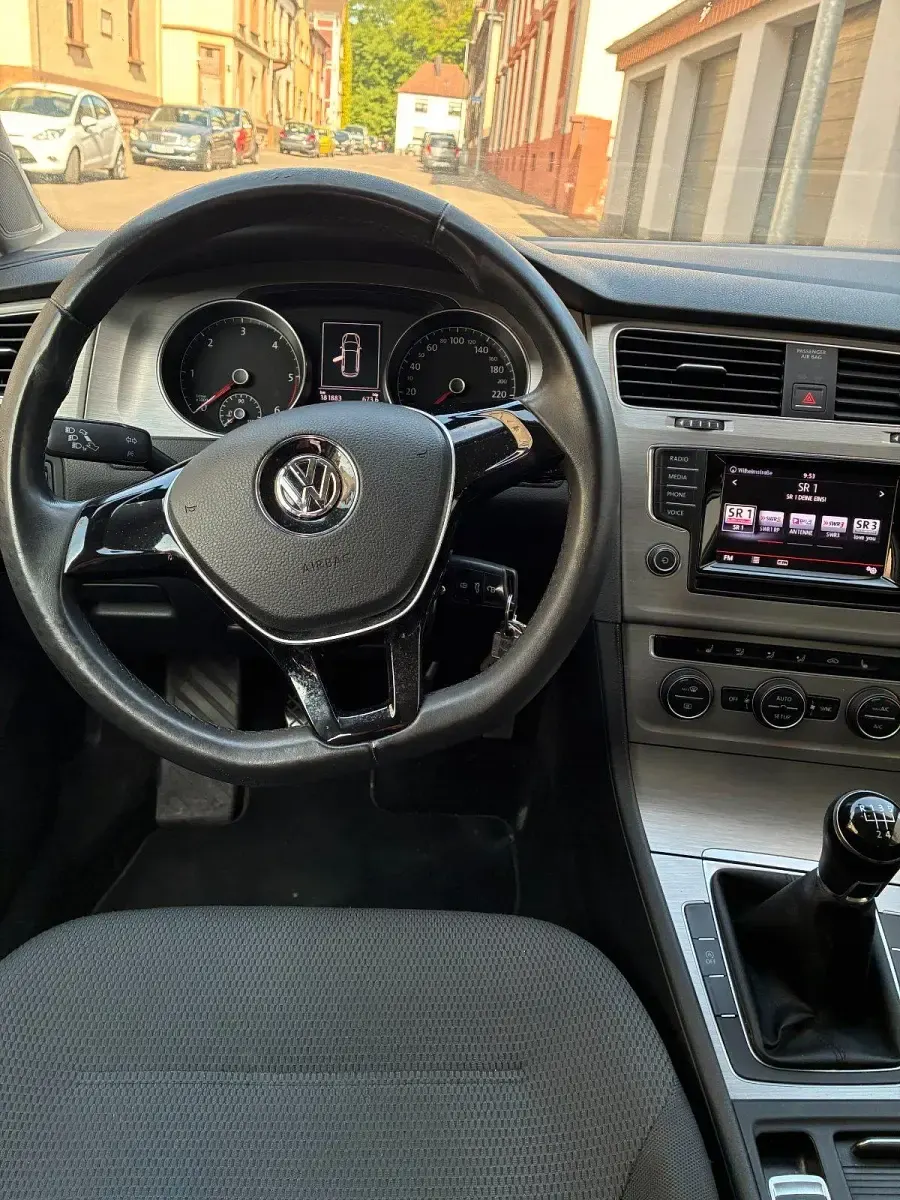Second-hand VW Golf VII 105 CP (77 kW) 2014 Argintiu Break