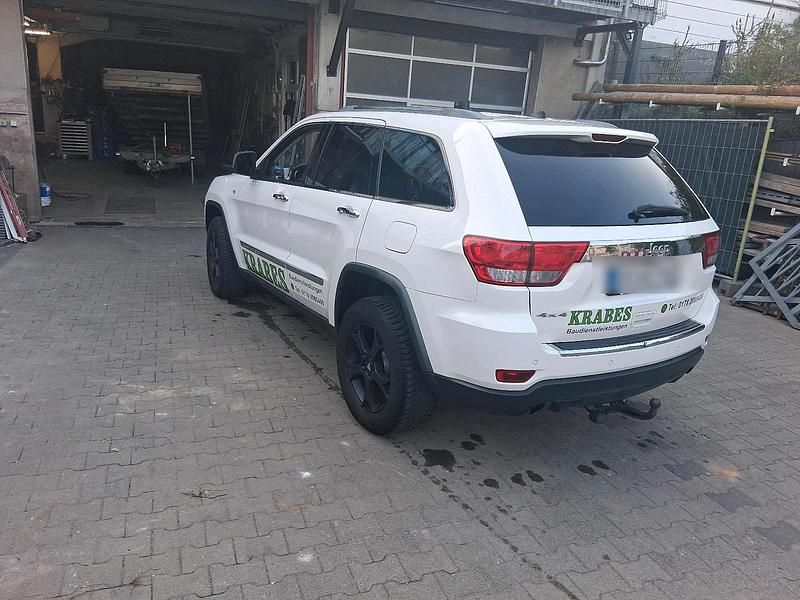 Weiß Gebraucht 2012 Jeep Grand Cherokee Overland SUV | 15.500 € (Teuer) - Bild 1/4