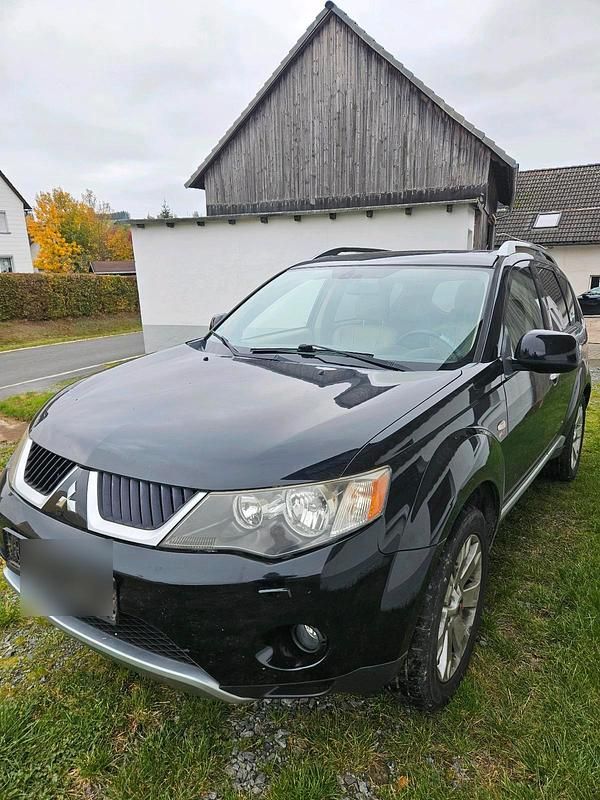 Schwarz Gebraucht 2009 Mitsubishi Outlander SUV | 3.950 € (Superpreis) - Bild 1/4