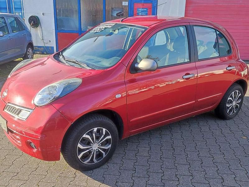 Emotion red (m) Gebraucht 2009 Nissan Micra Kleinwagen | 5.350 € (Teuer) - Bild 1/4