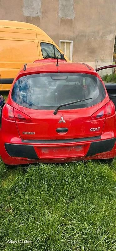 Second-hand Mitsubishi Colt 75 CP (55 kW) 2007 Roșu Hatchback
