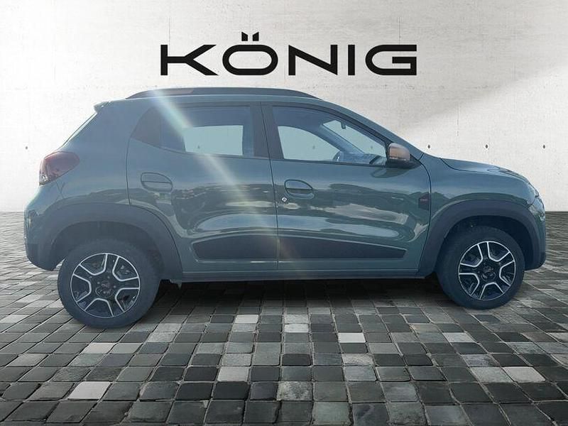 Gebraucht Dacia Spring Extreme 47 kW (65 PS) 2023 Grün "flechtengrau" Kleinwagen