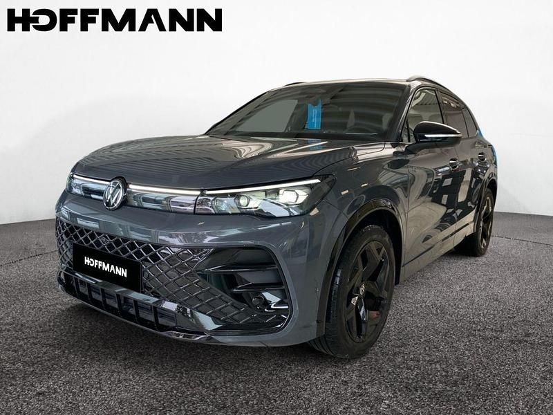 Dolphin gray metallic Gebraucht 2024 VW Tiguan R-line SUV | 44.890 € (Teuer) - Bild 1/4