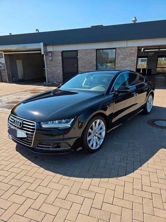 Schwarz Gebraucht 2015 Audi A7 Sportback Ambiente Kleinwagen | 16.499 € (Superpreis) - Bild 1/4