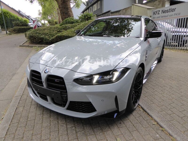 Grau Gebraucht 2024 BMW M4 Performance Coupé | 91.500 € (Teuer) - Bild 1/4