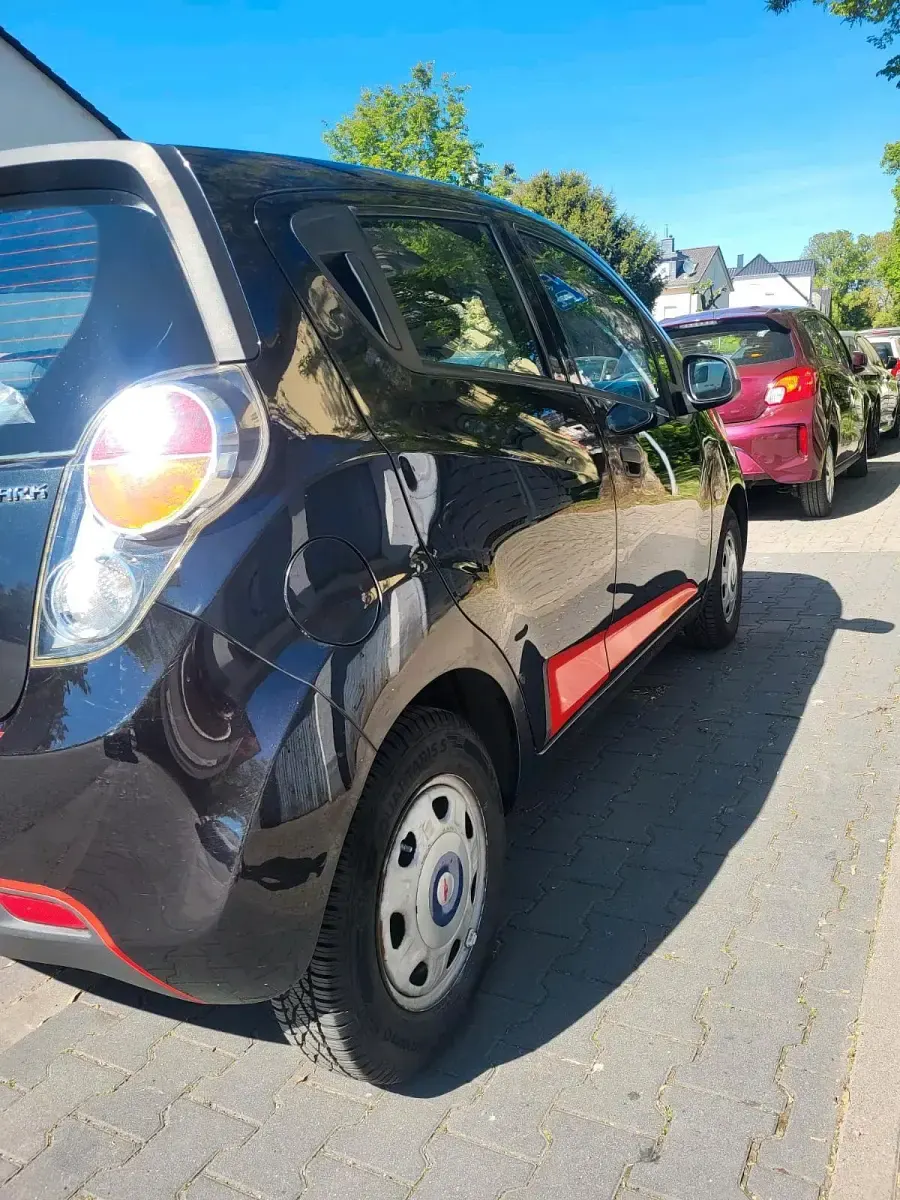 Gebraucht Chevrolet Spark 68 PS (50 kW) 2012 Schwarz Kleinwagen