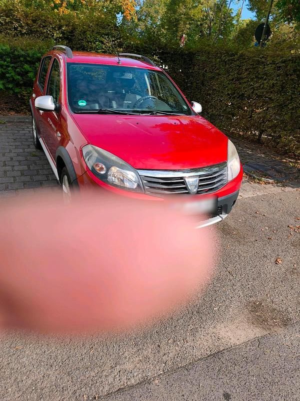 Rot Gebraucht 2012 Dacia Sandero Stepway Kleinwagen | 4.500 € - Bild 1/4