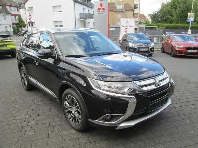Schwarz Gebraucht 2015 Mitsubishi Outlander Plus SUV | 13.990 € (Fairer Preis) - Bild 1/4