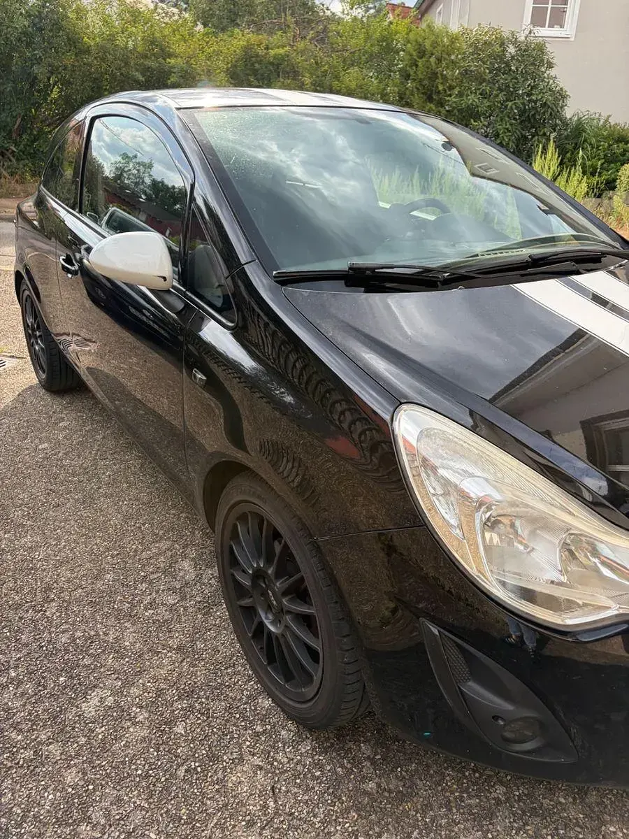 Gebraucht Opel Corsa 87 PS (63 kW) 2011 Schwarz Kleinwagen