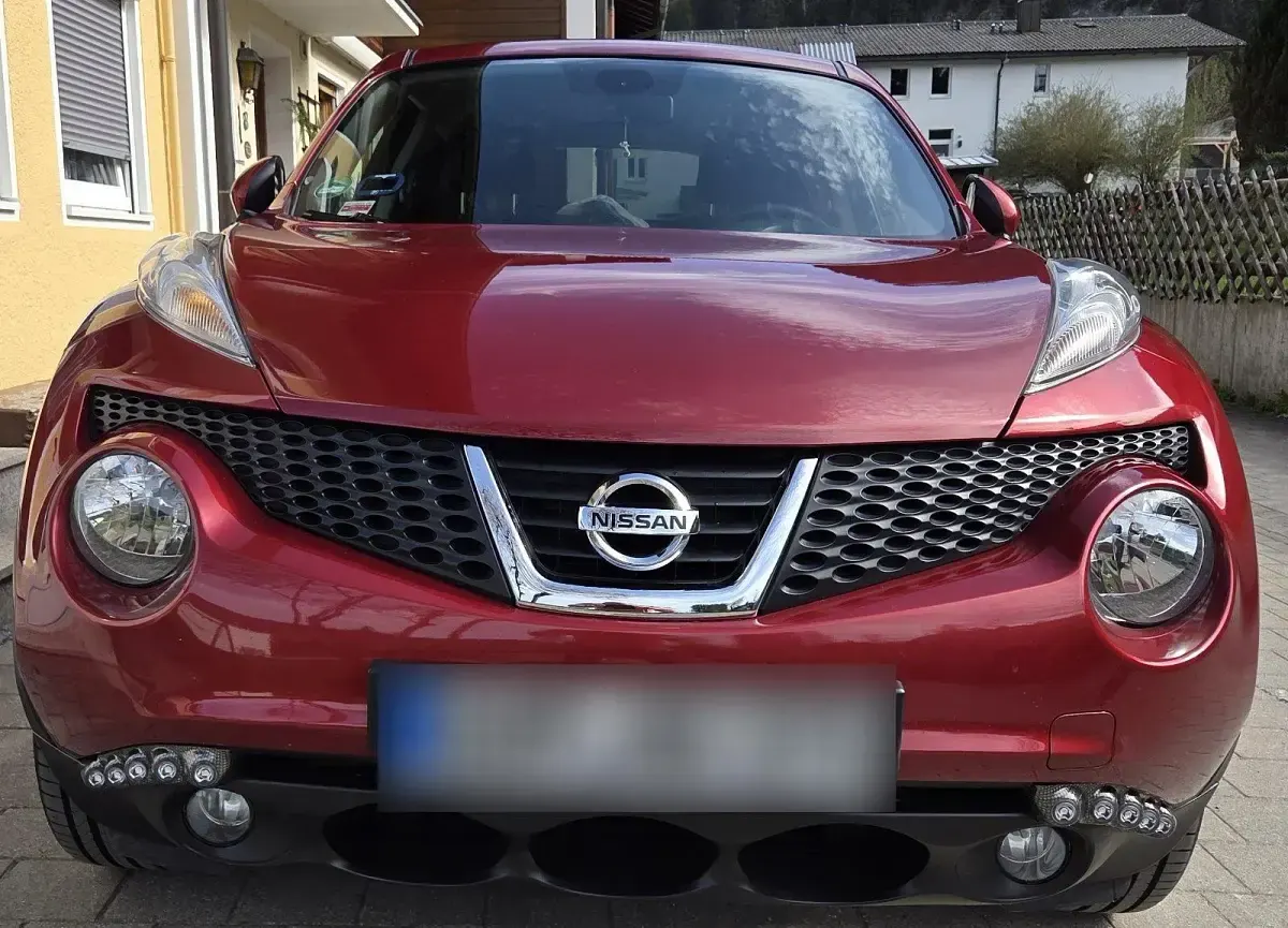 Second-hand Nissan Juke Tekna 117 CP (86 kW) 2012 Roșu SUV