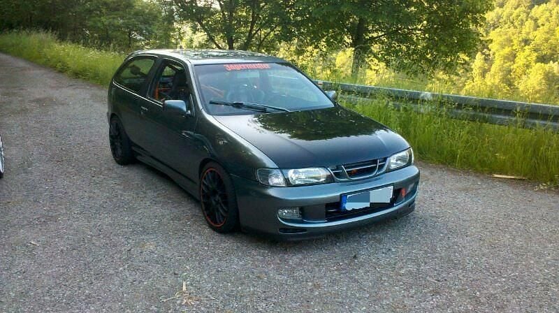 Grau Gebraucht 1998 Nissan Almera Kleinwagen | 5.999 € - Bild 1/4