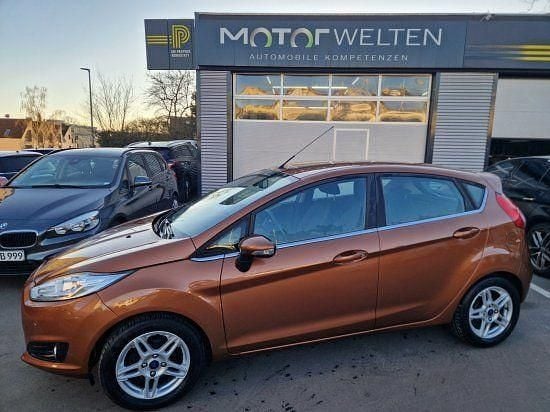 Gebraucht Ford Fiesta Titanium 101 PS (74 kW) 2014 Torinobraun metallic Kleinwagen