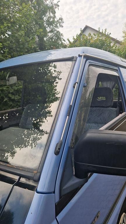 Gebraucht Mitsubishi L300 111 PS (81 kW) 1994 Grau Van / Kleinbus