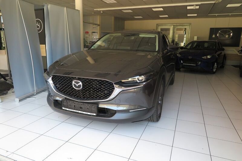 Machine gray Gebraucht 2024 Mazda CX-30 Exclusive-Line SUV | 28.900 € (Fairer Preis) - Bild 1/4