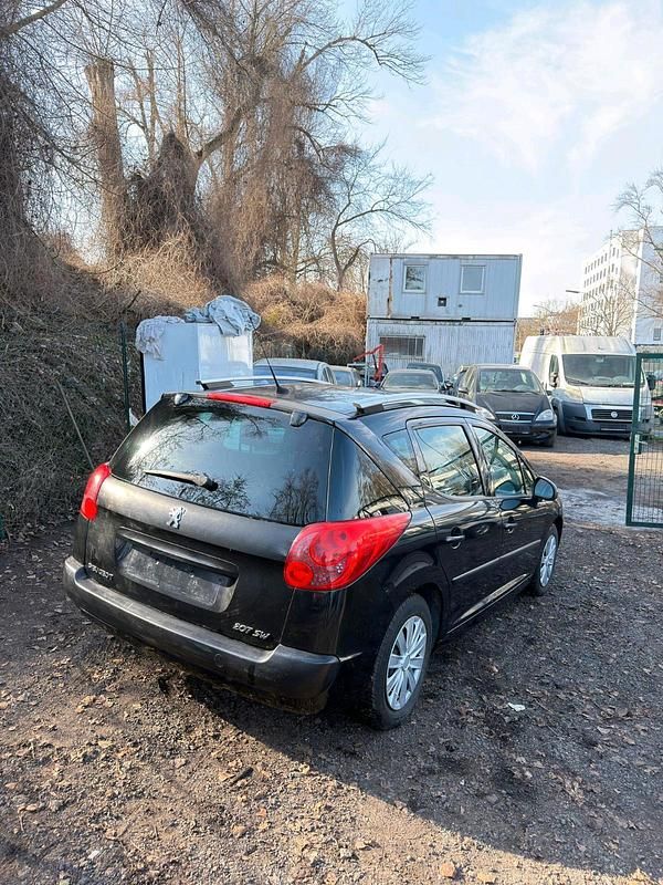 Gebraucht Peugeot 207 95 PS (69 kW) 2008 Schwarz Kombi