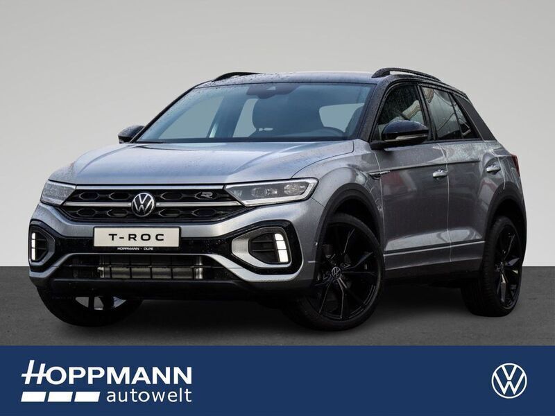 Pyritsilber metallic / schwarz Gebraucht 2025 VW T-Roc R-line SUV | 35.580 € (Teuer) - Bild 1/4