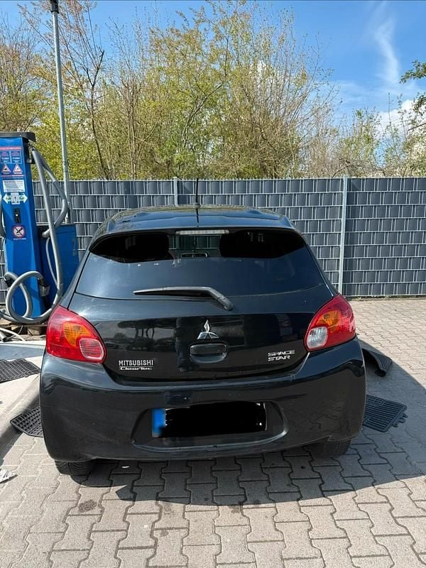 Second-hand Mitsubishi Space Star 80 CP (58 kW) 2015 Negru Berlinǎ