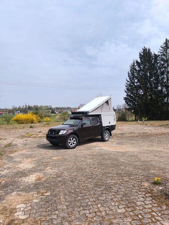 Braun Gebraucht 2013 Nissan Navara Abholung | 29.990 € - Bild 1/4