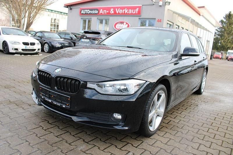 Schwarz Gebraucht 2014 BMW 320 Kombi | 7.990 € (Superpreis) - Bild 1/4