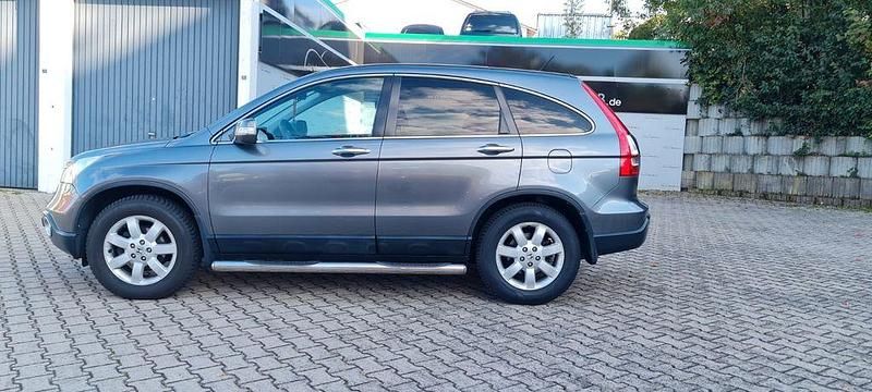 Grau Gebraucht 2009 Honda CR-V Comfort SUV | 9.350 € (Etwas zu teuer) - Bild 1/4