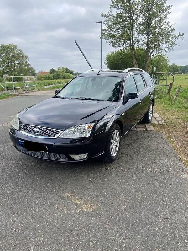 Schwarz Gebraucht 2006 Ford Mondeo Ghia Kombi | 1.900 € (Fairer Preis) - Bild 1/4