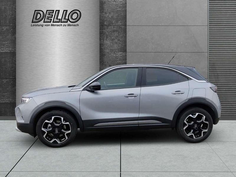 Gebraucht Opel Mokka-e Ultimate 100 kW (136 PS) 2022 Kontrast grau/quarz silber SUV