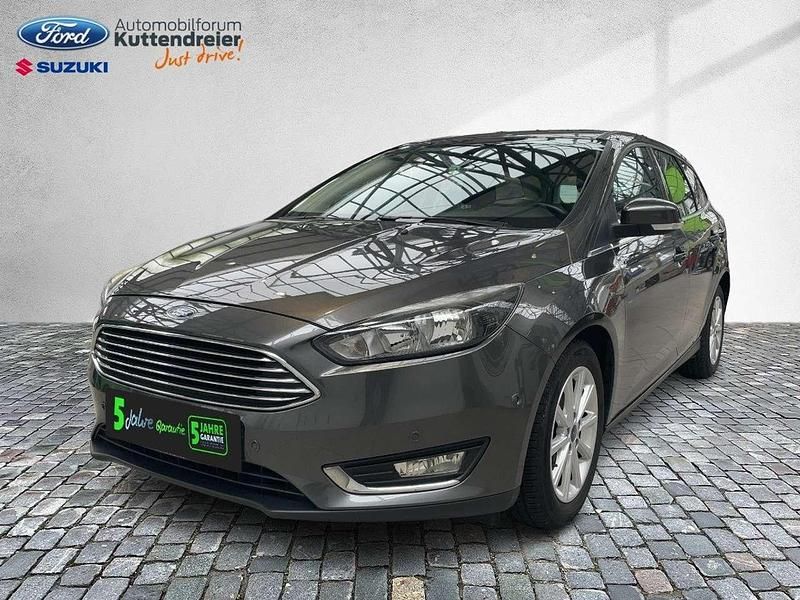 Magneticgrau (metallic) Gebraucht 2016 Ford Focus Titanium Kombi | 5.440 € (Superpreis) - Bild 1/3