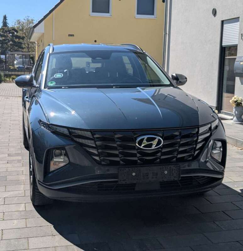 Blau Gebraucht 2023 Hyundai Tucson Select SUV | 28.499 € (Superpreis) - Bild 1/4
