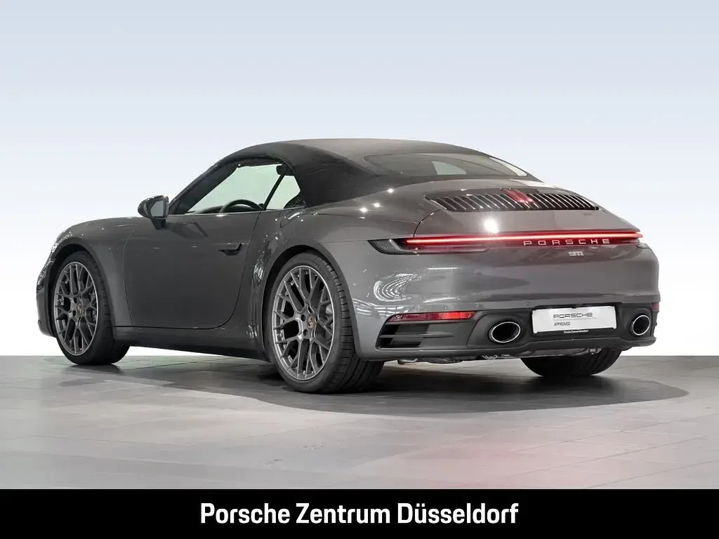 Gebraucht Porsche 911 Carrera Cabriolet 385 PS (283 kW) 2022 Achatgraumetallic Cabrio