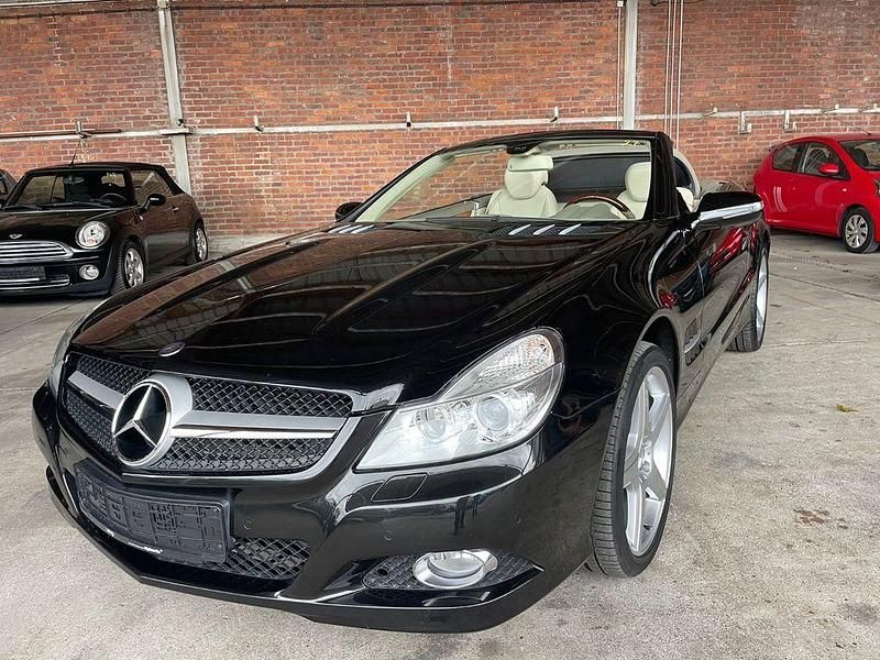 Schwarz Gebraucht 2008 Mercedes SLR McLaren Cabrio | 31.999 € - Bild 1/4