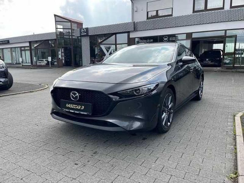 Machine grey (metallic) Gebraucht 2021 Mazda 3 Selection Limousine | 17.890 € (Guter Preis) - Bild 1/4
