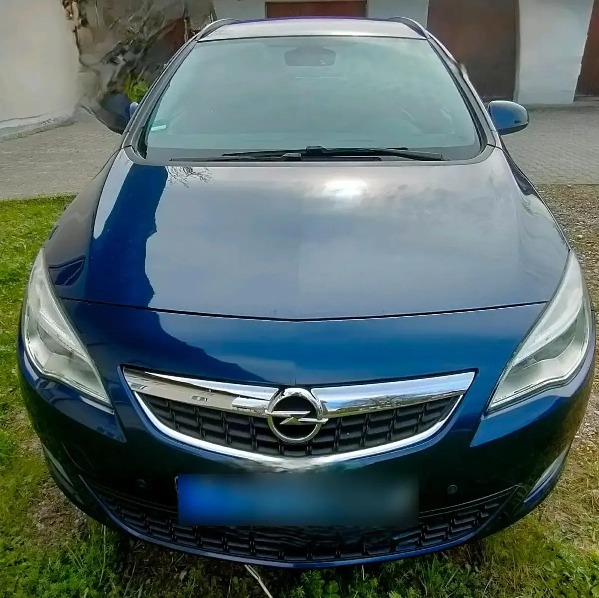 Second-hand Opel Astra 120 CP (88 kW) 2011 Albastru Break