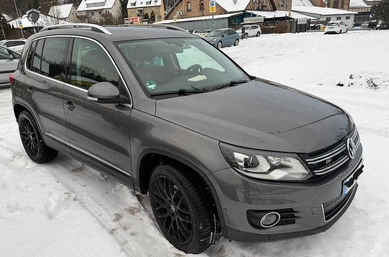 Grau Gebraucht 2012 VW Tiguan Sportline SUV | 13.400 € (Teuer) - Bild 1/4