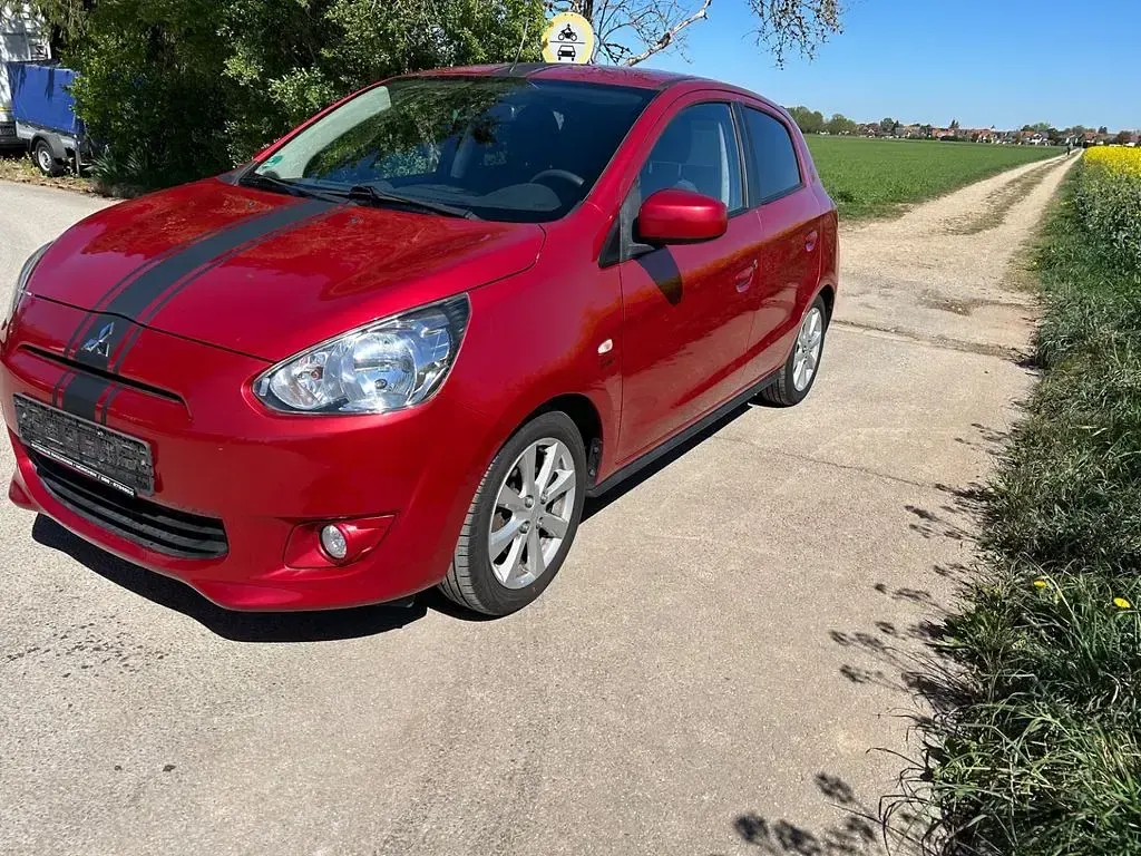 Gebraucht Mitsubishi Space Star 80 PS (58 kW) 2013 Rot Van / Kleinbus
