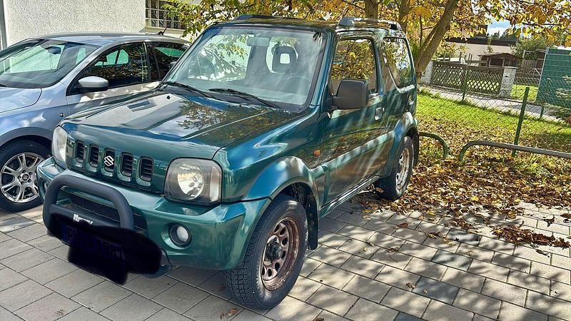 Grün Gebraucht 2001 Suzuki Jimny SUV | 2.450 € (Superpreis) - Bild 1/4